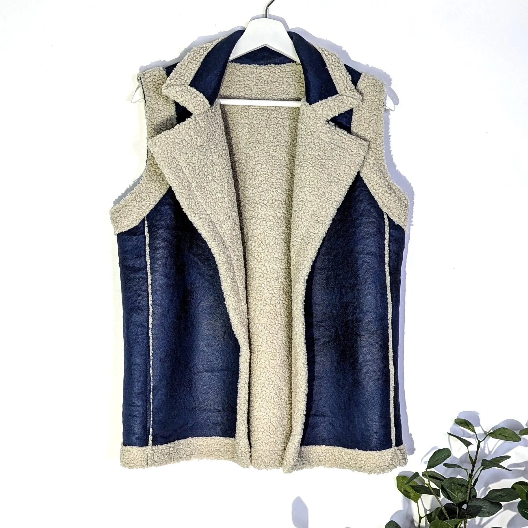 Faux sheep skin style gilet with lapels and vertical seams (M)
